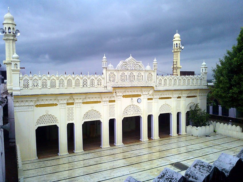 The façade under monsoon clouds