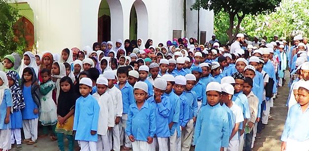 Students of the school section in the courtyard